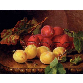 Plums On A Table In A Glass Bowl